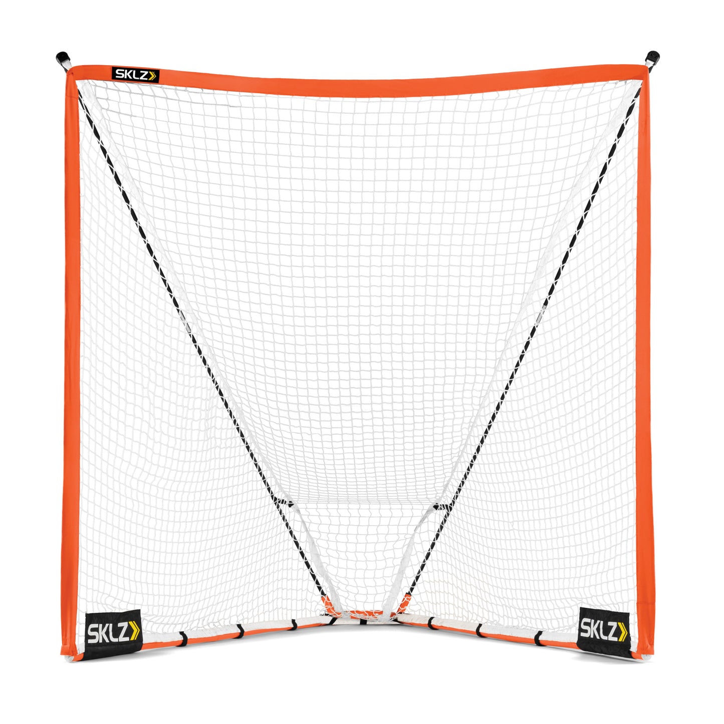 A soccer goal with a net stands in an open field for practice or gameplay