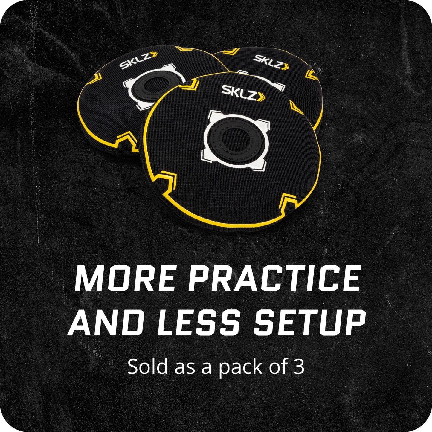 Three SKLZ sliding discs are arranged on a black surface for practice drills