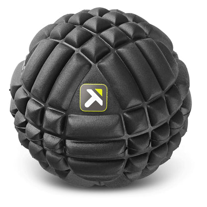 A textured black exercise ball with a logo on its surface in a plain white background