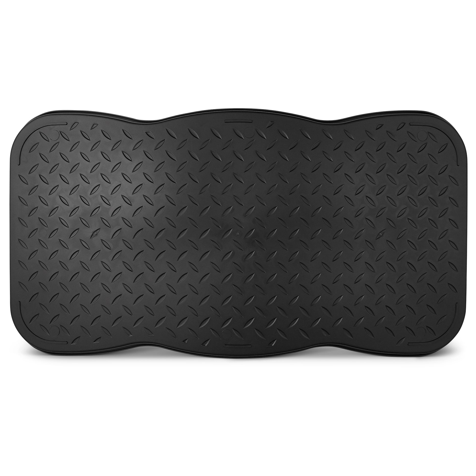 A black rubber mat lies flat on a white surface, likely used for cushioning or grip.