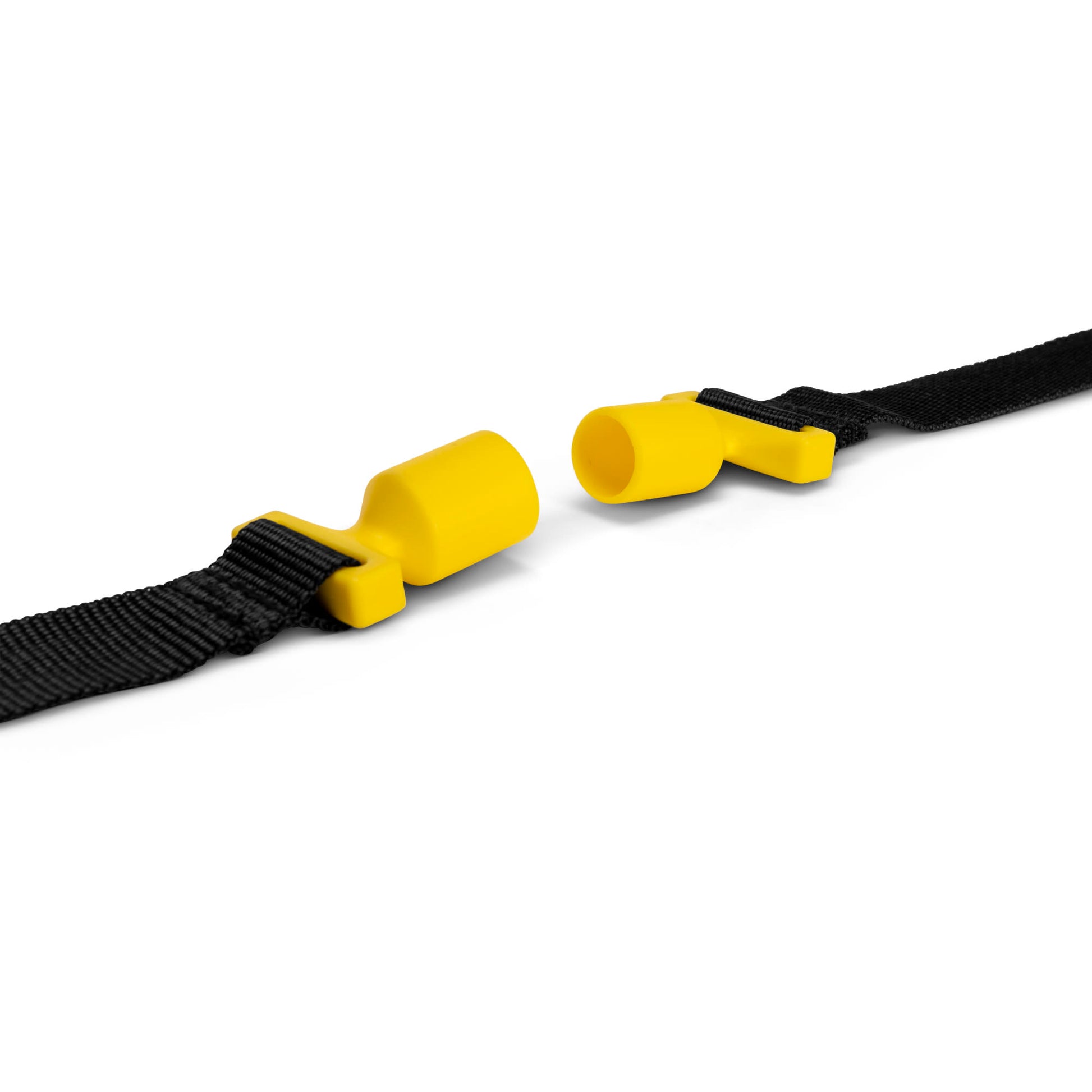 The yellow clip secures a black strap in a fitness or safety setting