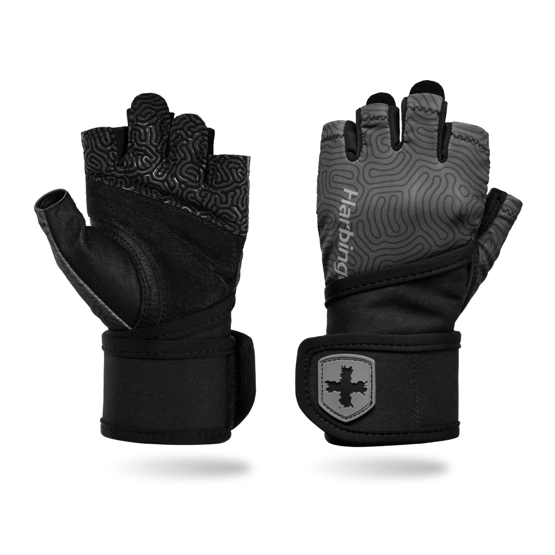 Pair of black cycling gloves with textured palms resting against a white background.