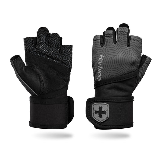 Pair of black cycling gloves with textured palms resting against a white background.