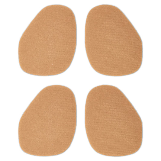 Four beige adhesive pads are arranged in a square on a white background.