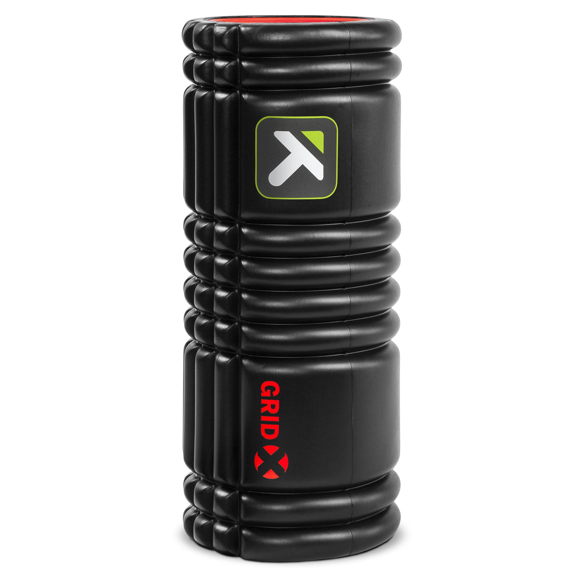 The foam roller compresses muscles in a gym environment for muscle relief and recovery.