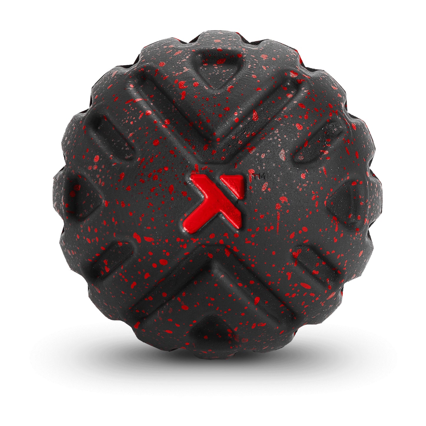 A black textured object with red paint speckles and a red X symbol in the center.