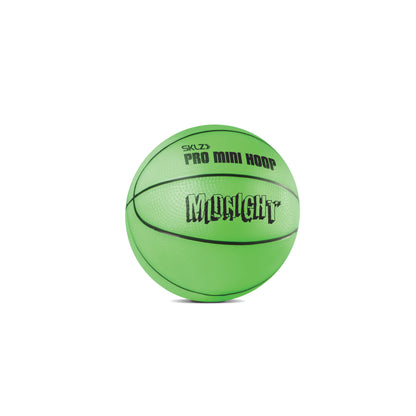 A green mini basketball rests on a white background for training or recreation purposes