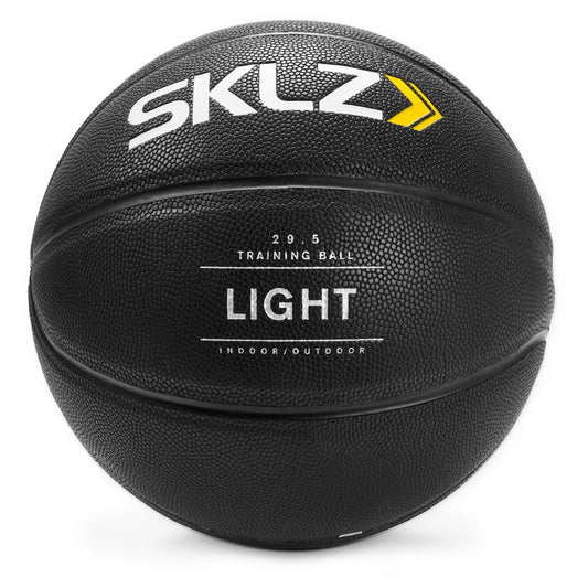 A black training basketball with white and yellow branding on a white background