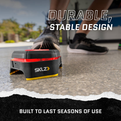 A portable device tests the surface stability outdoors near footwear