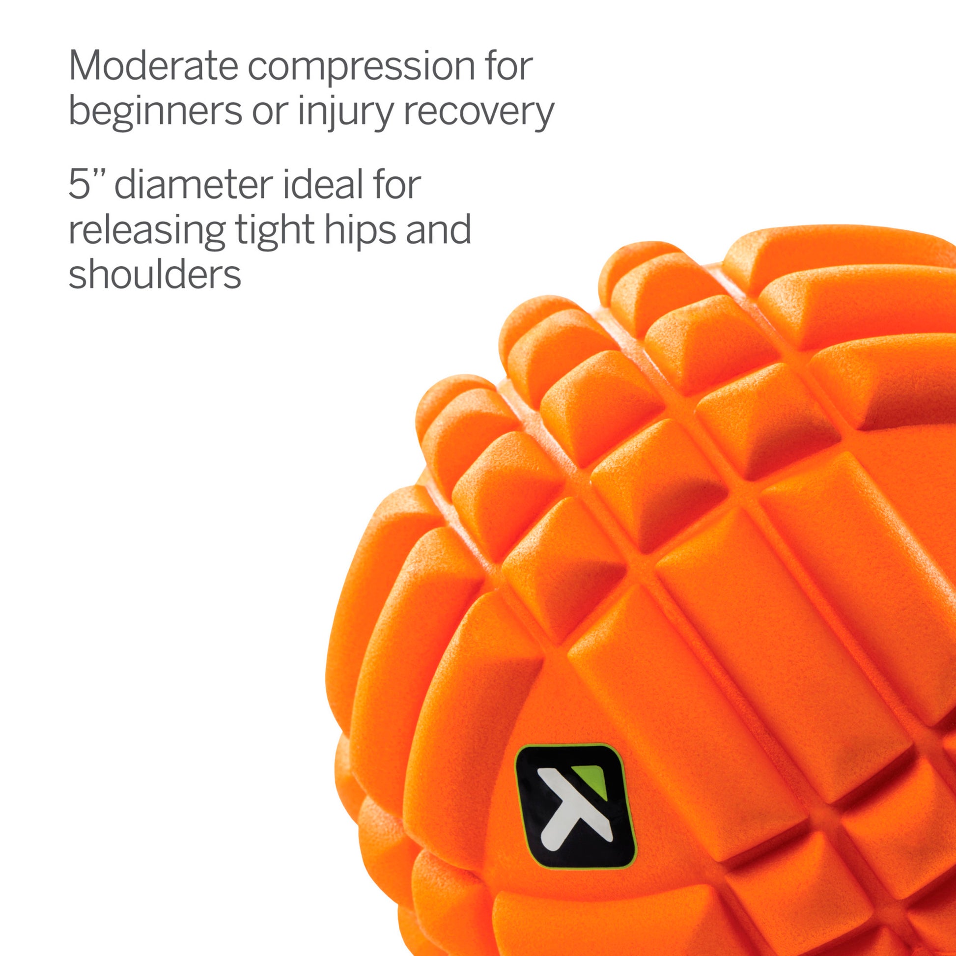 Foam massage ball compresses gently for muscle release on a white background