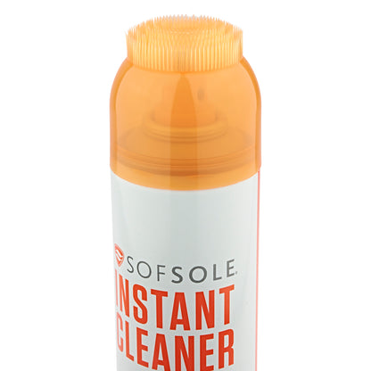 A spray bottle labeled instant cleaner sprays in a white environment with an orange cap.