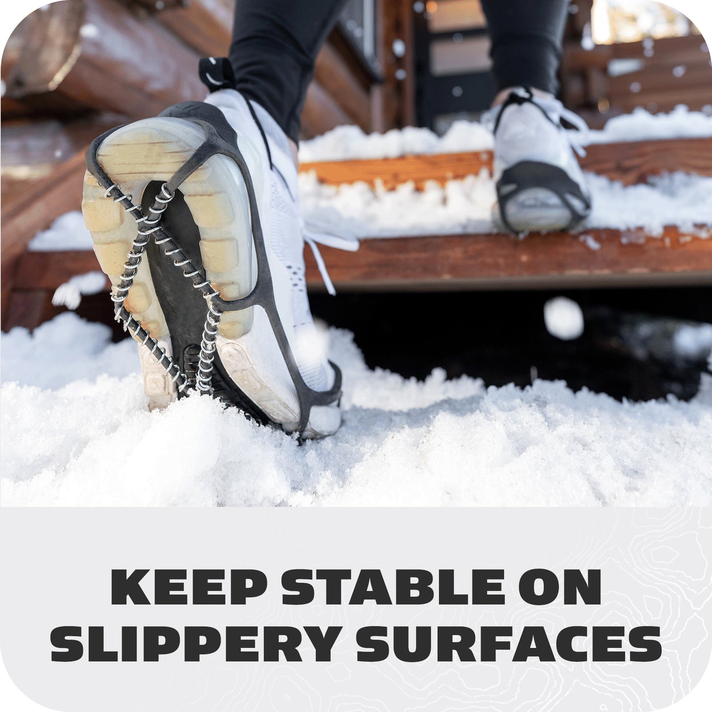 Person wears snow shoes on wooden stairs over snow to prevent slipping.