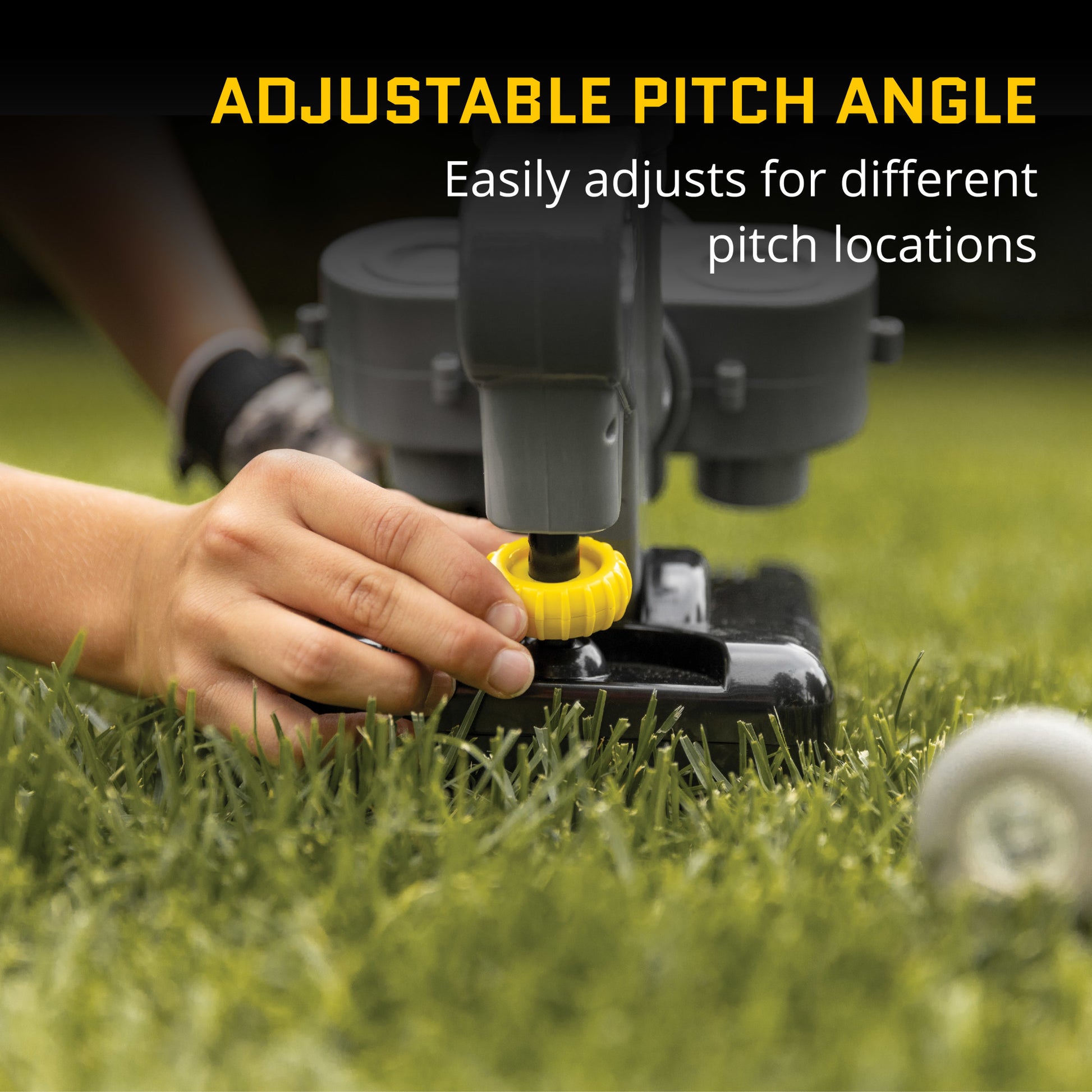 Hand adjusts a lawn sprinkler on grass to change pitch angle for watering.