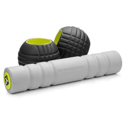 Foam roller and massage balls facilitate muscle relief and flexibility exercises in a gym setting