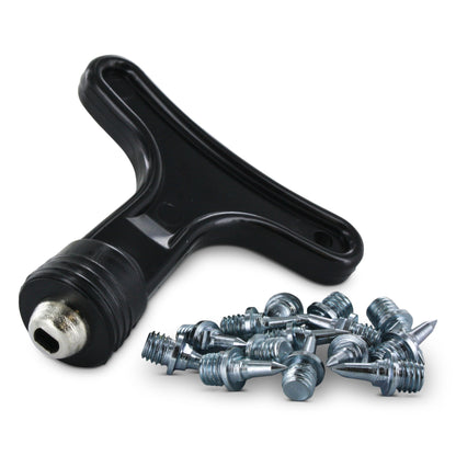 A T-handle wrench secures screws for bicycle maintenance in a workshop.