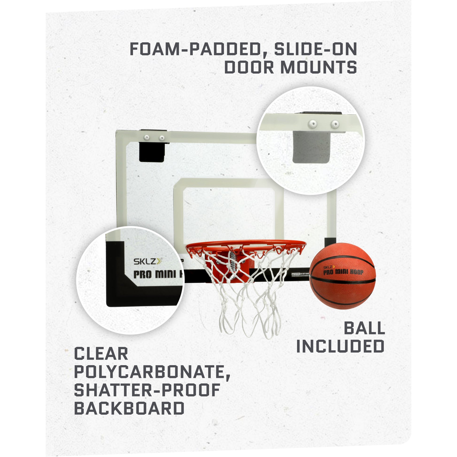 Foampadded basketball hoop with clear polycarbonate backboard and included ball in environment