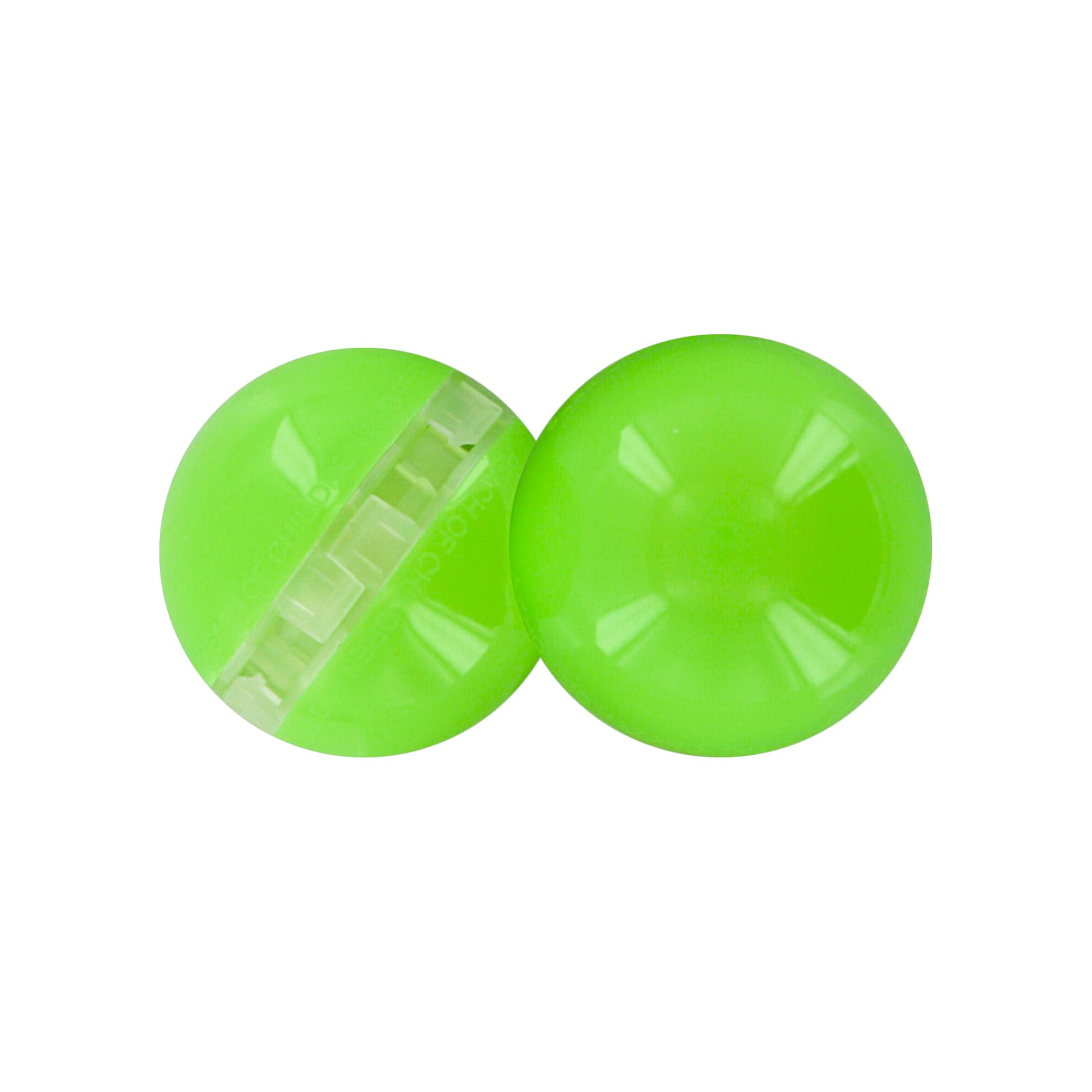 Two green golf balls rest on a white background.
