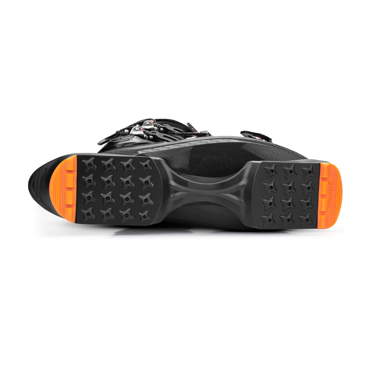 Ski boot rests on its sole with orange traction pads on a plain white background