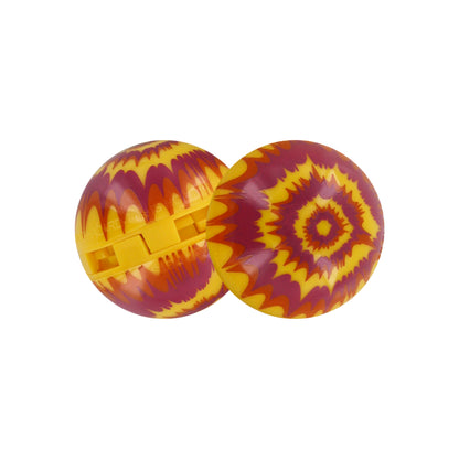 Two plastic marbles with tie-dye patterns roll on a white surface.