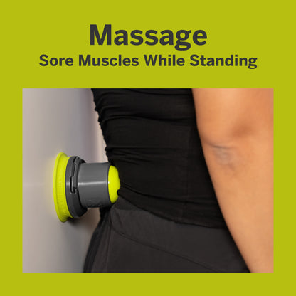A massage tool applying pressure to sore muscles on a person's side during therapy session.
