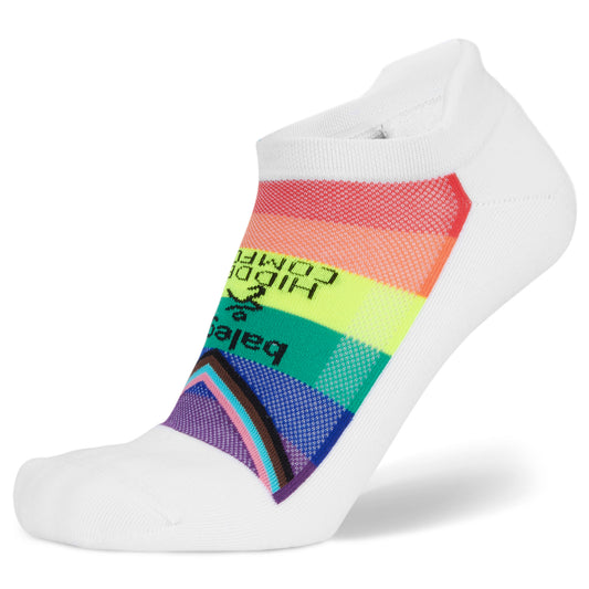 A white sock features a rainbow-colored label with text in a retail store setting.