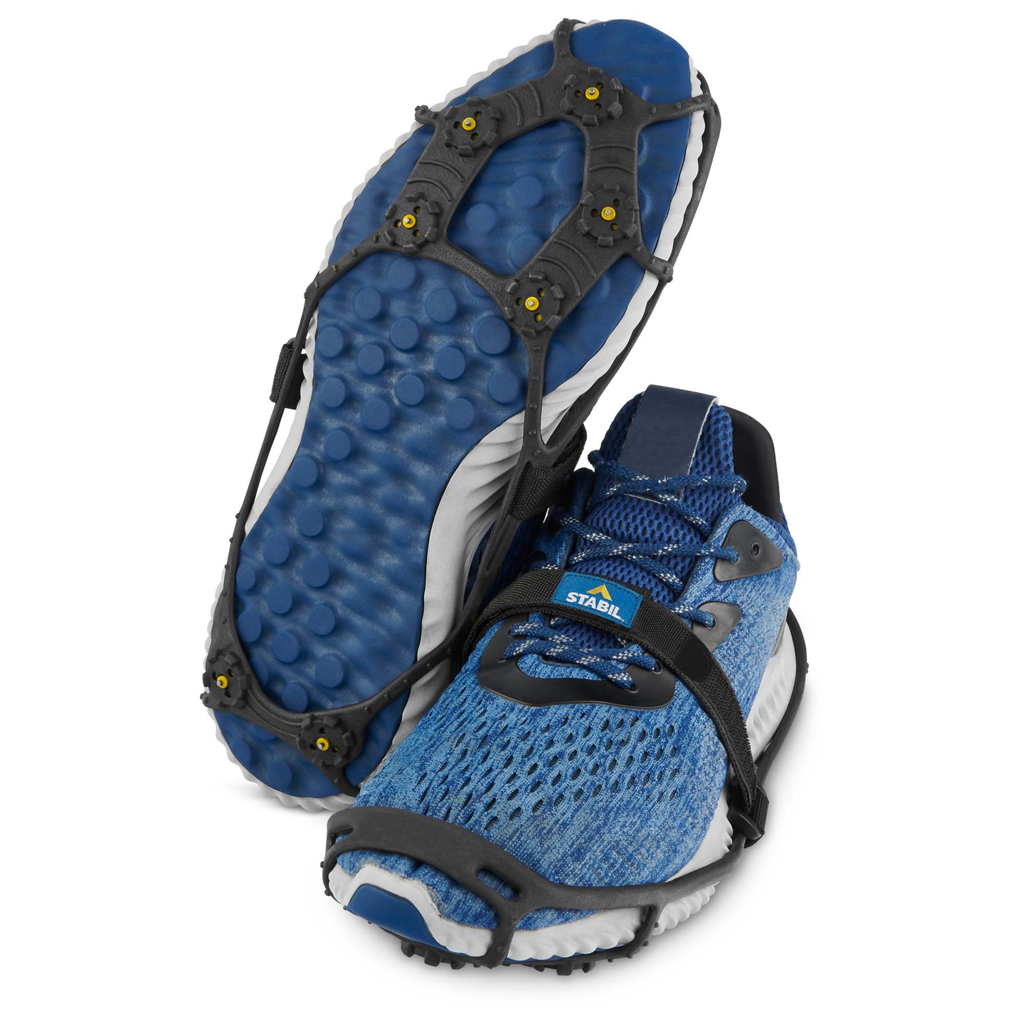 Running shoe secures with a harness on a disruptive sole for trail running outdoors.