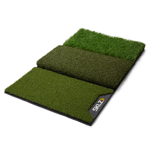 Artificial grass samples are displayed together on a black backing sheet