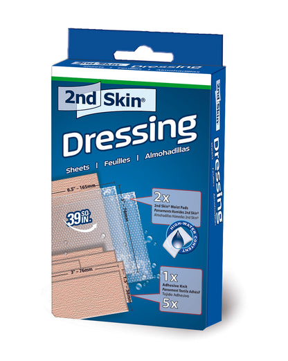 The box contains dressing sheets and pads for wound care in a pharmacy or medical setting