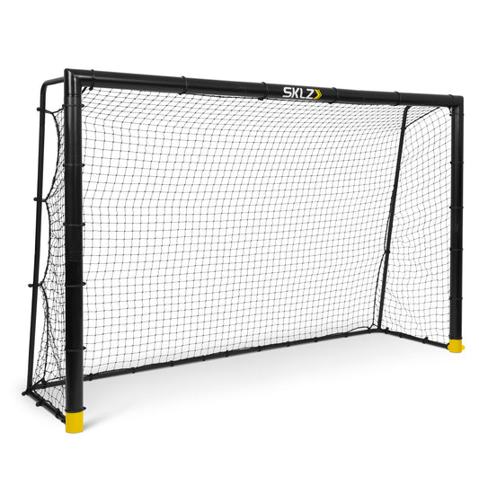 The goalpost is set up on a plain surface for sports practice or gameplay.