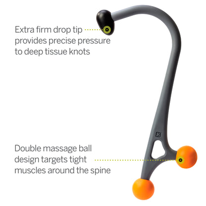 Stretcher targets tight muscles around the spine with double massage balls in a clinical setting.