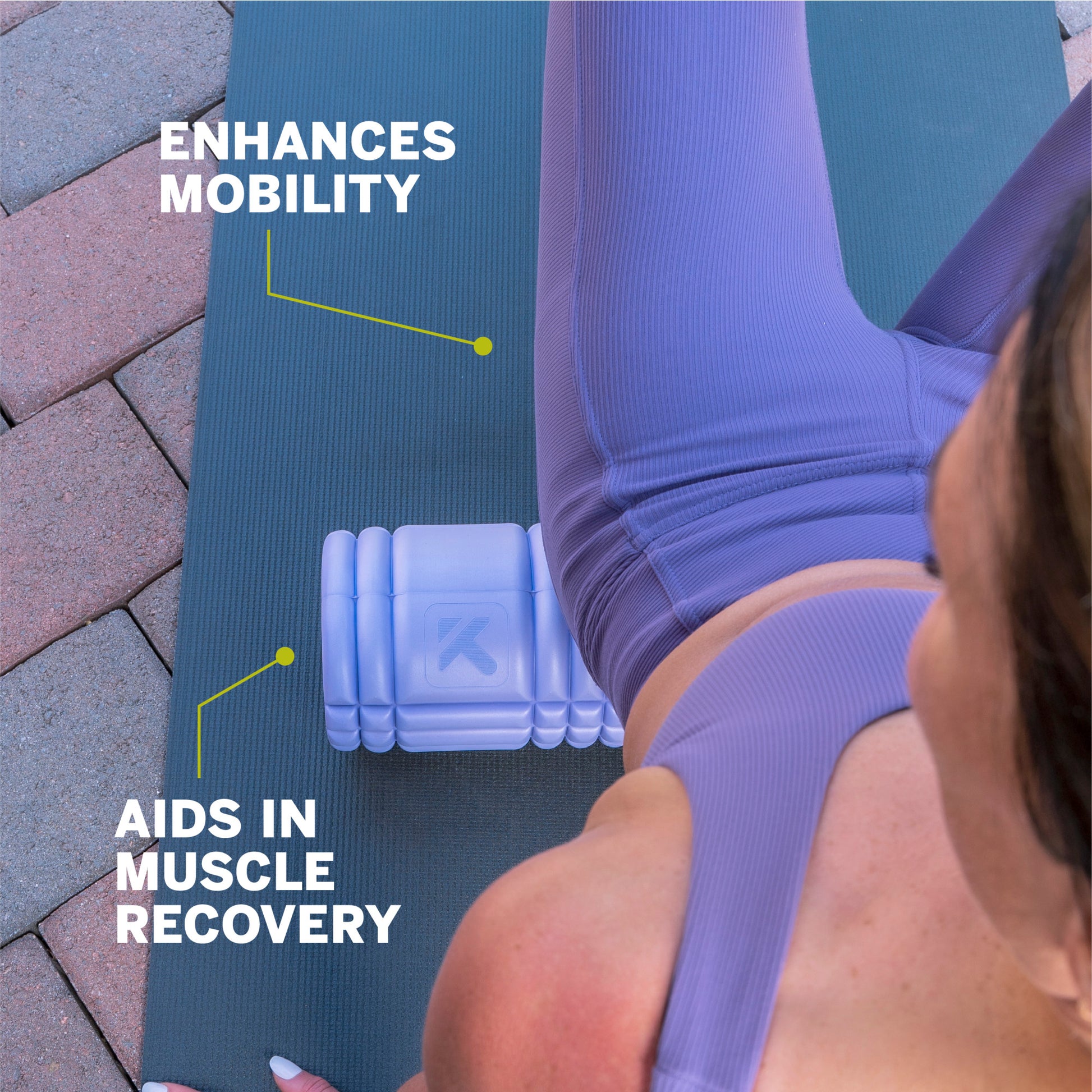 Foam roller aids muscle recovery and enhances mobility on outdoor exercise mat.