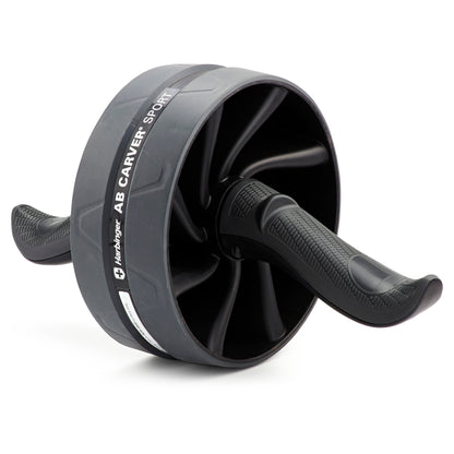 The ab roller propels forward on a flat surface during exercise.