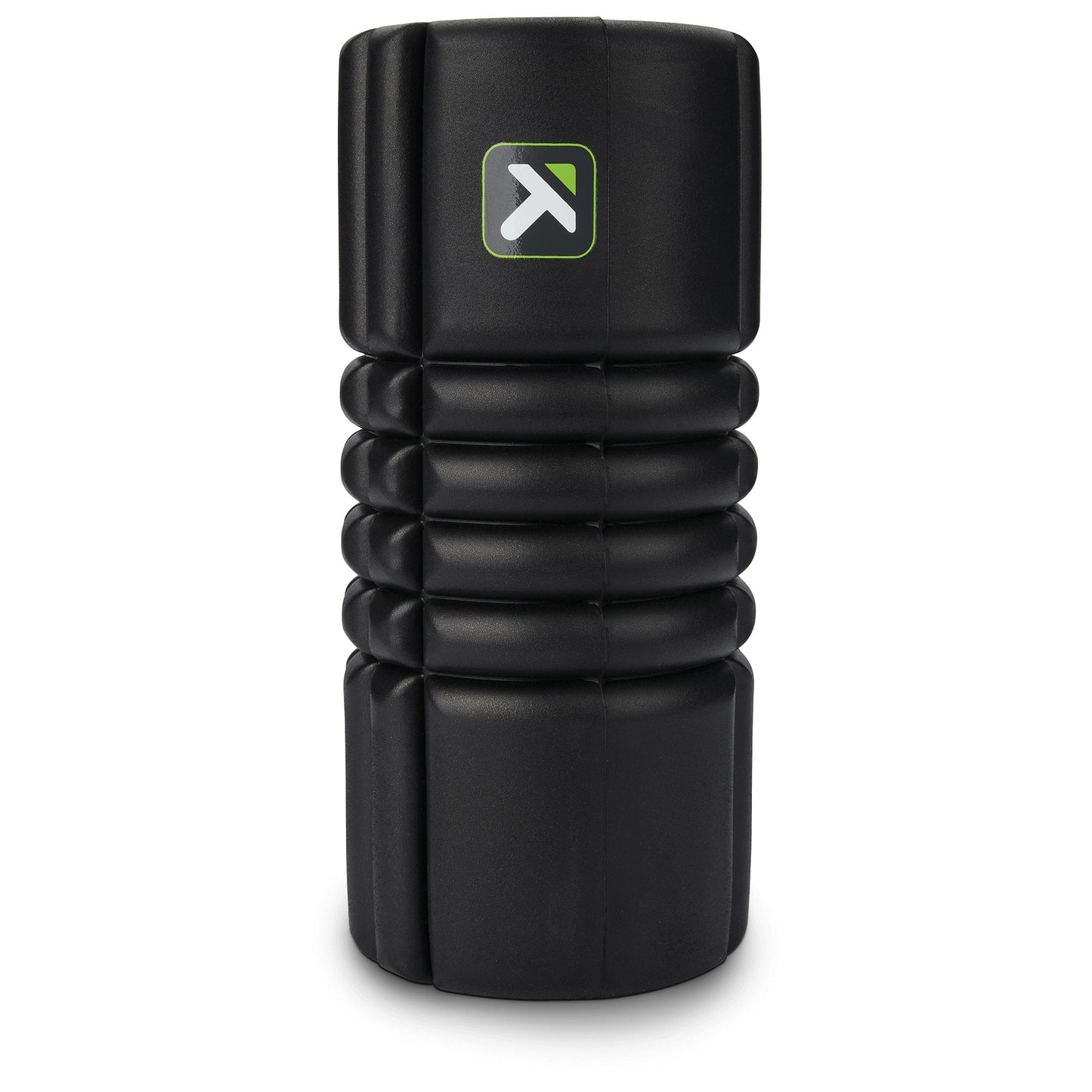 A black foam roller in a vertical position on a plain background for muscle relaxation.