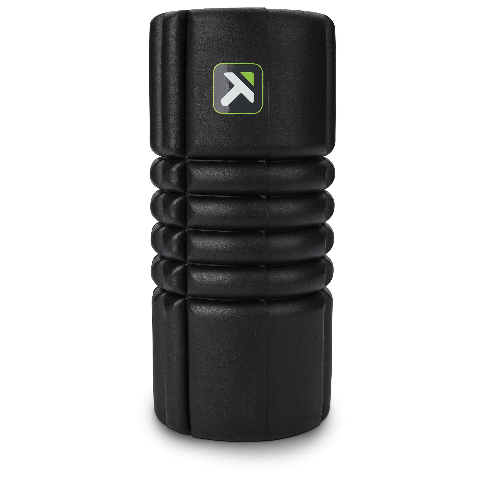 A black foam roller in a vertical position on a plain background for muscle relaxation.
