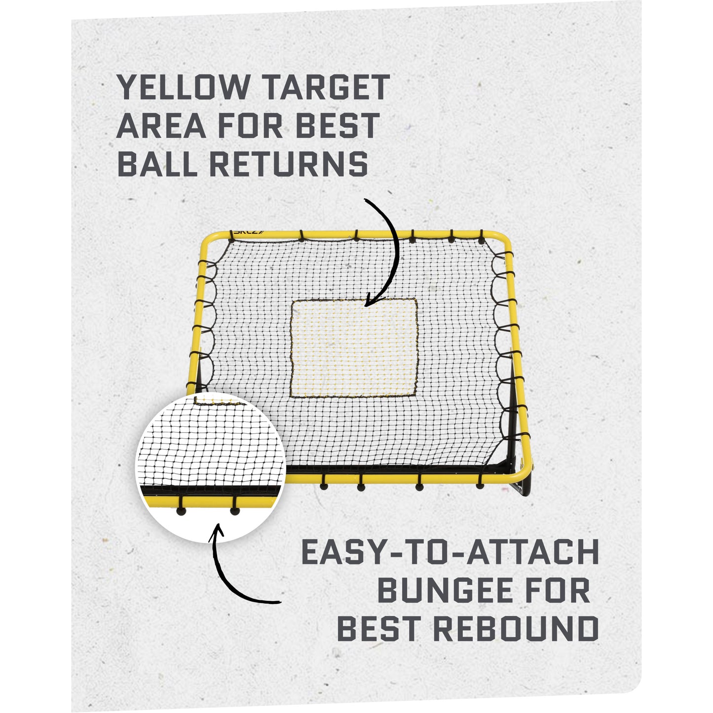 A square net with a yellow border is set up in a gym for ball returns and rebounding practice.