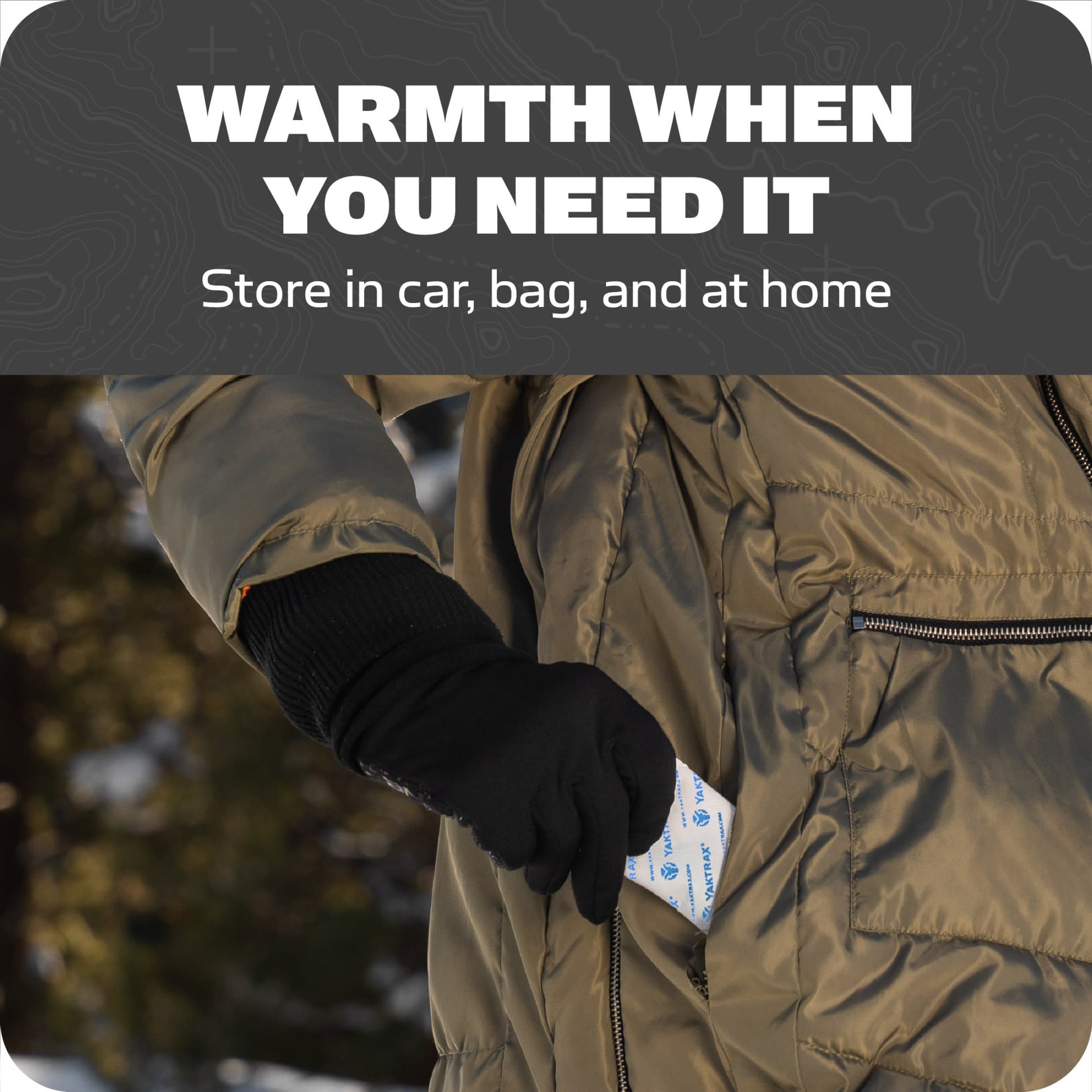 A person inserts a hot pack into a coat pocket to stay warm outdoors