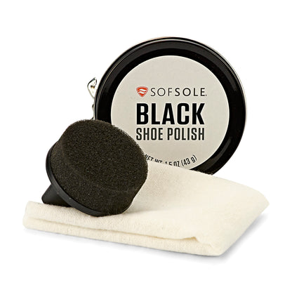 Shoe polish applies black color with sponge on a cloth in a shoe care kit.