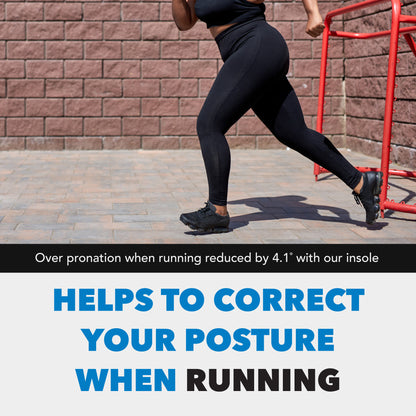 Runner moves forward on a paved path, next to a brick wall and red railing.