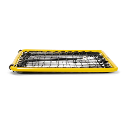 A heated sports training mat rests on a white background for agility practice training.