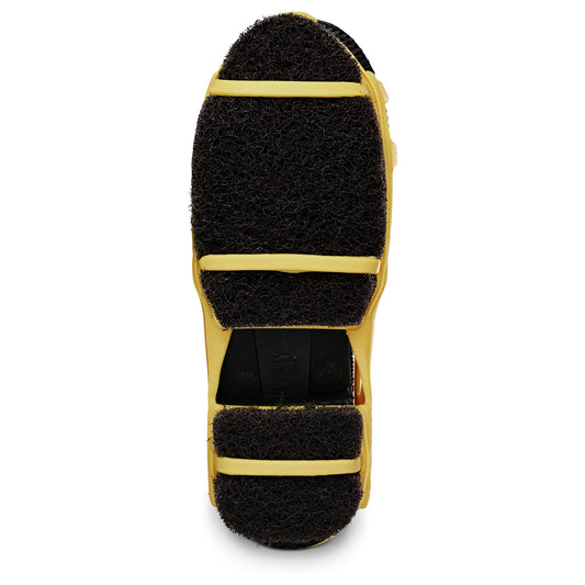 A cleaning scrubber with yellow plastic and black abrasive pads isolated on white background.