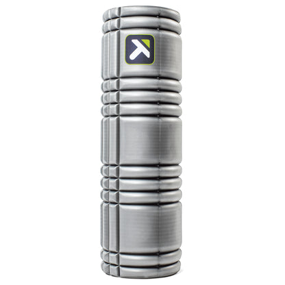 A silver cylindrical device stands upright with a logo on a white background.