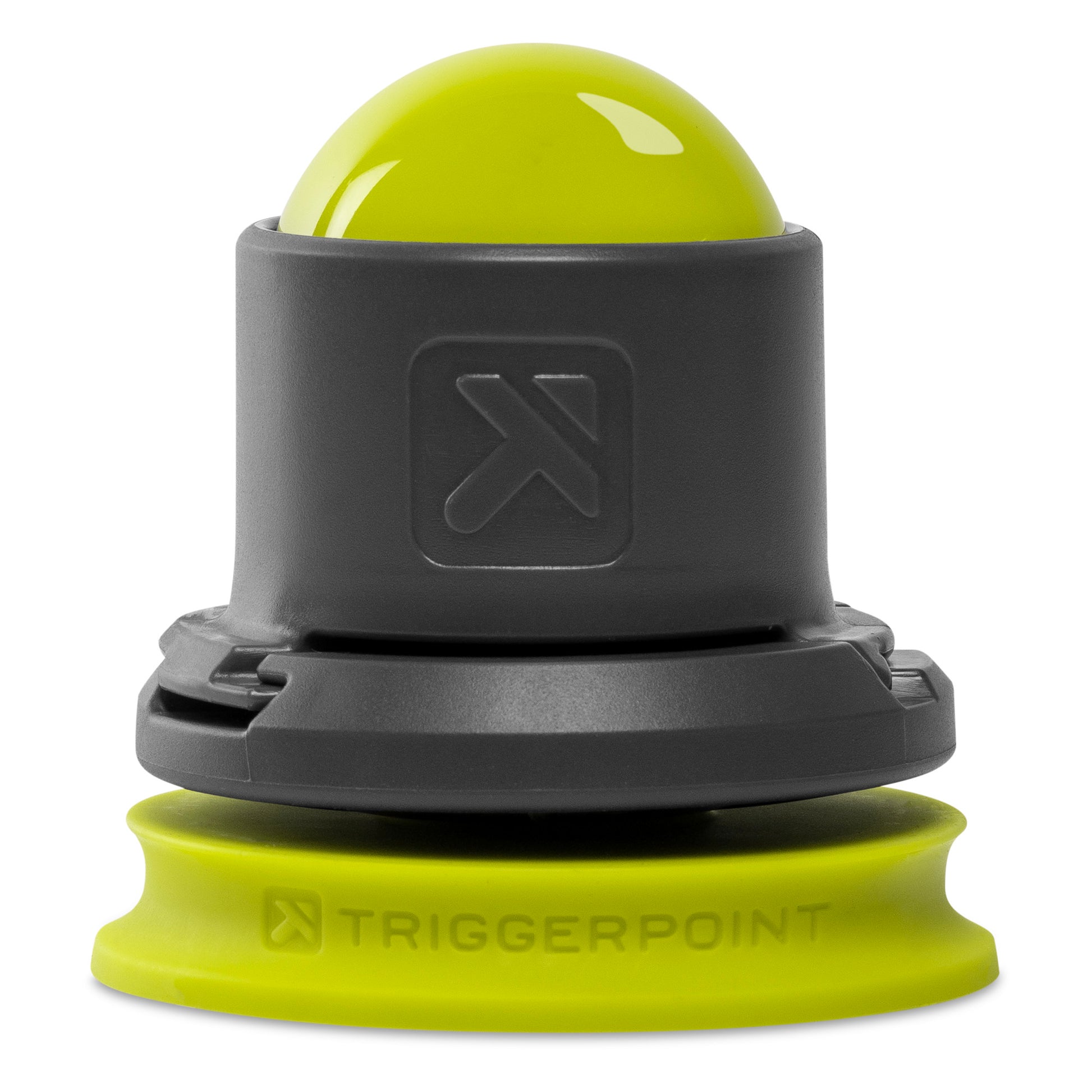 Triggerpoint massage ball rotates on a yellow base in a fitness setting