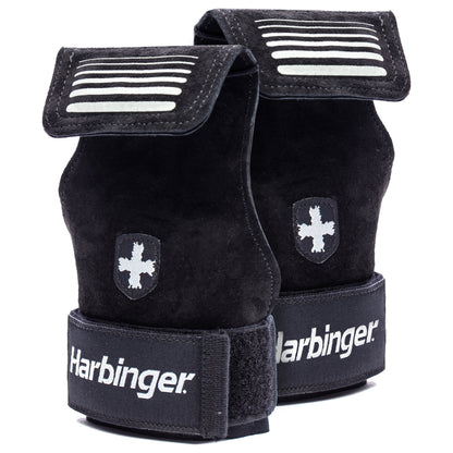 Wrist weights are placed on a surface, ready for use in exercise or training.