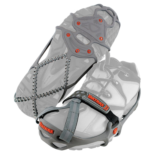 A hiking shoe equipped with an ice traction device for improved grip on ice surfaces.