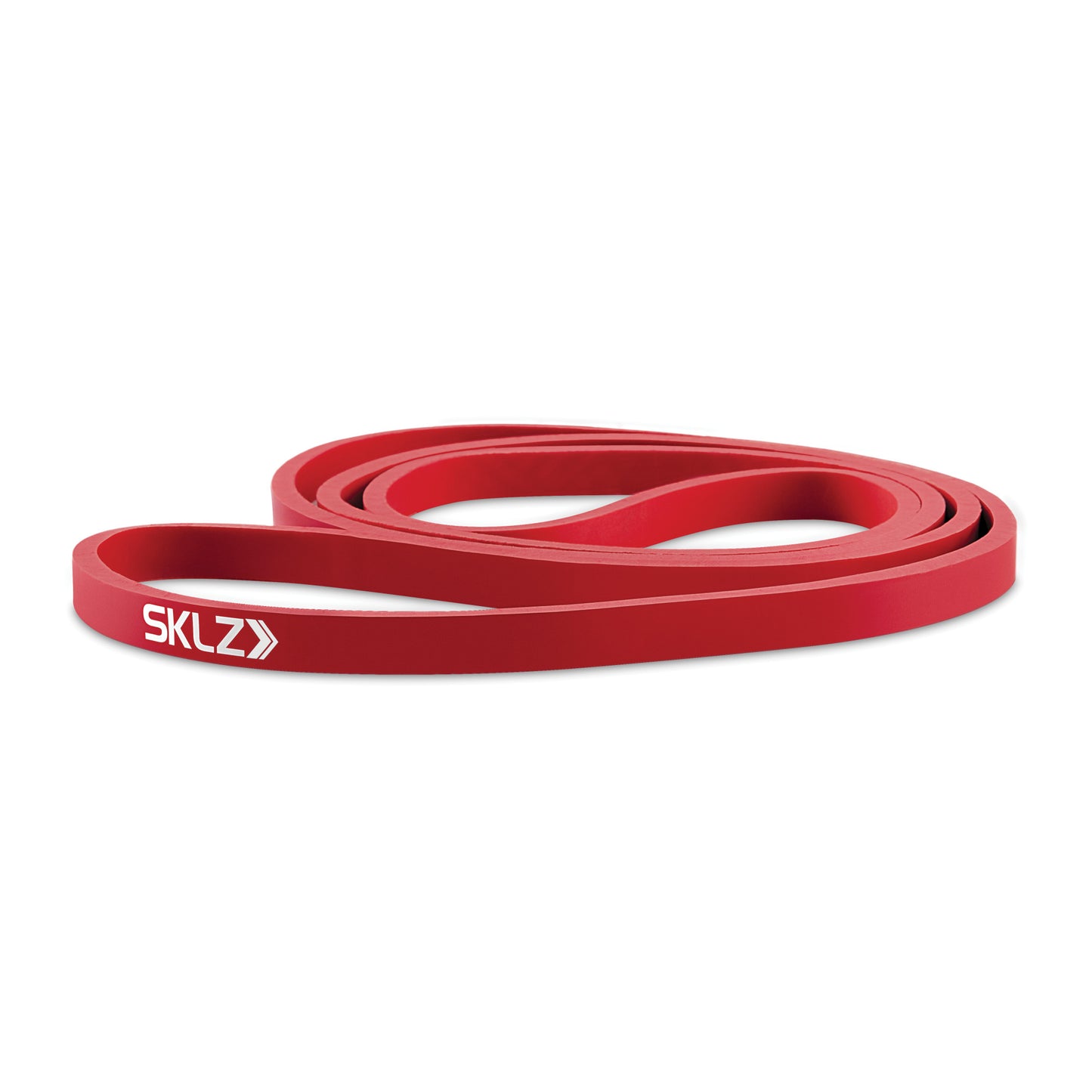 A red resistance band with white SKLZ branding coiled on a white background