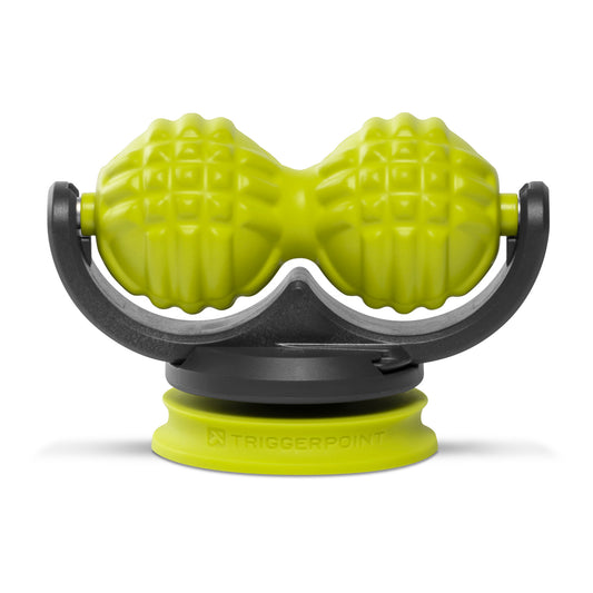 A massage roller moves on a base in a fitness environment.