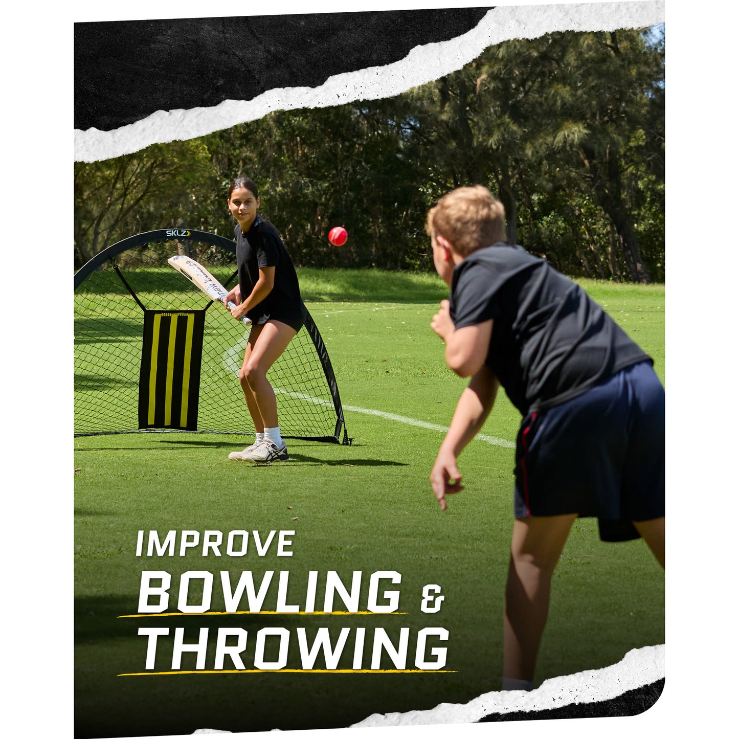 Girl practices bowling with a cricket bat on a grassy field during daytime