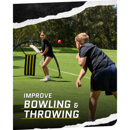 Girl practices bowling with a cricket bat on a grassy field during daytime