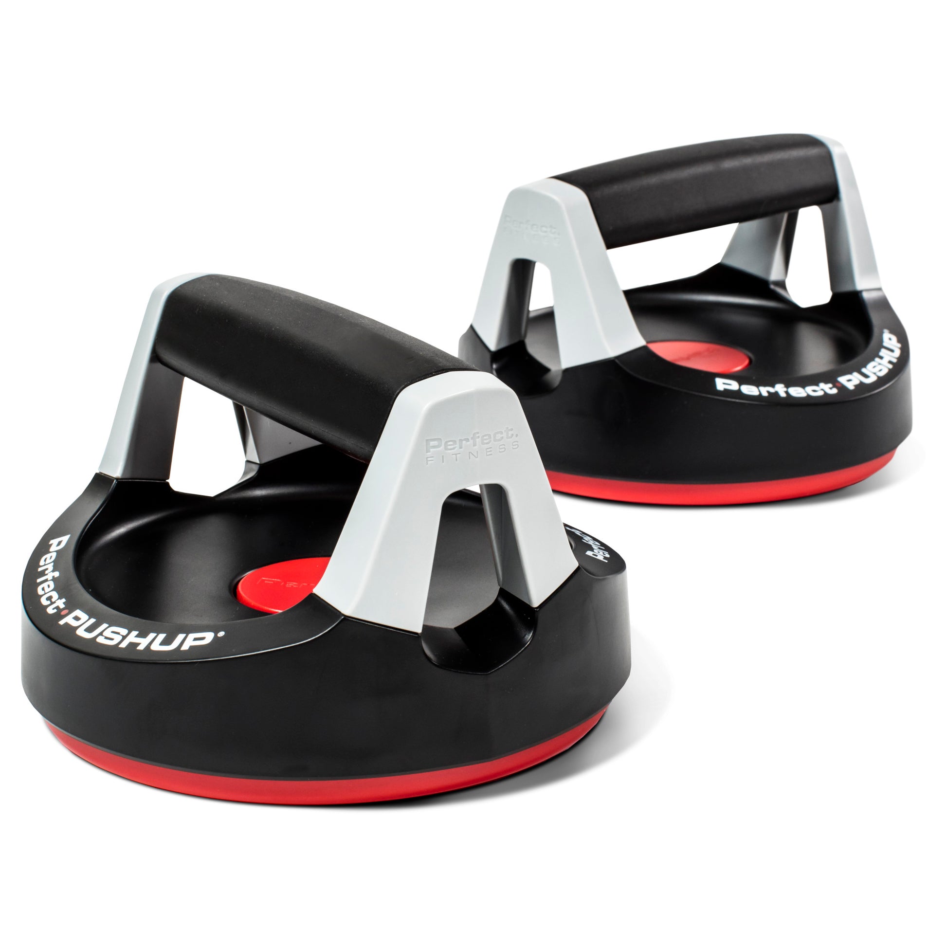 The push-up stand supports body weight for exercise in a gym environment.