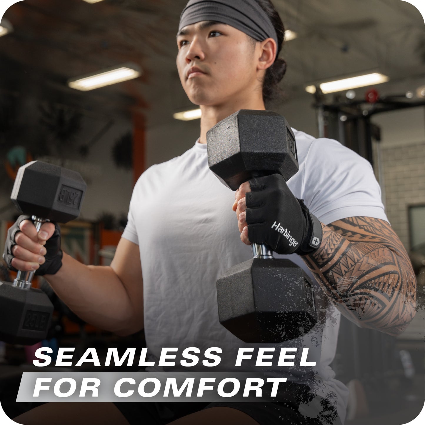Man lifts dumbbells in gym with text indicating seamless feel for comfort.